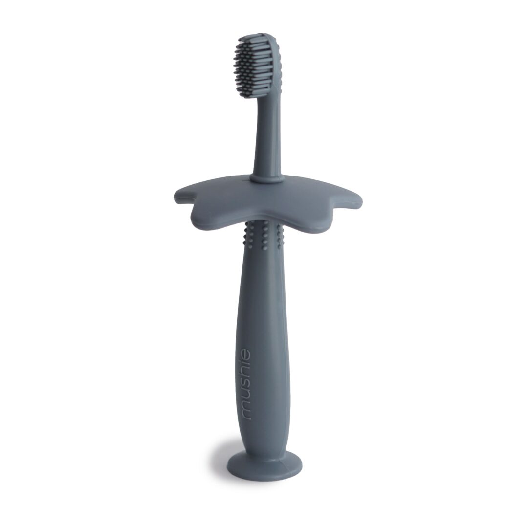 brosse à dents d'apprentissage en silicone mushie blue