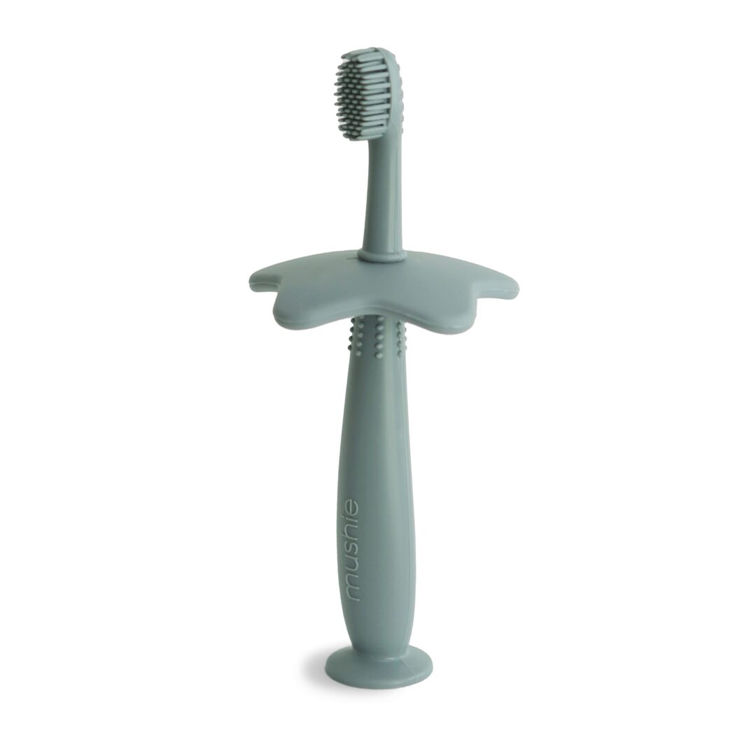 brosse à dents d'apprentissage en silicone mushie green